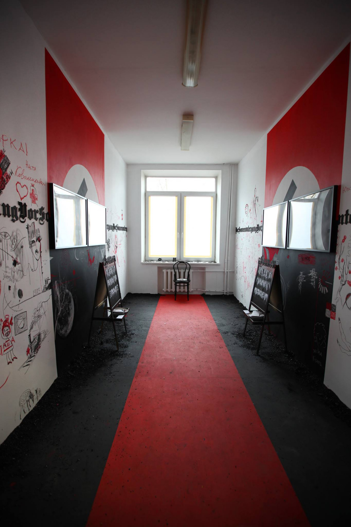 Yury Kharikov transformed his room into a black-and-red pavilion based on the motifs of the play 'Before Sunset.' POLINA BAKHTINA / FACEBOOK